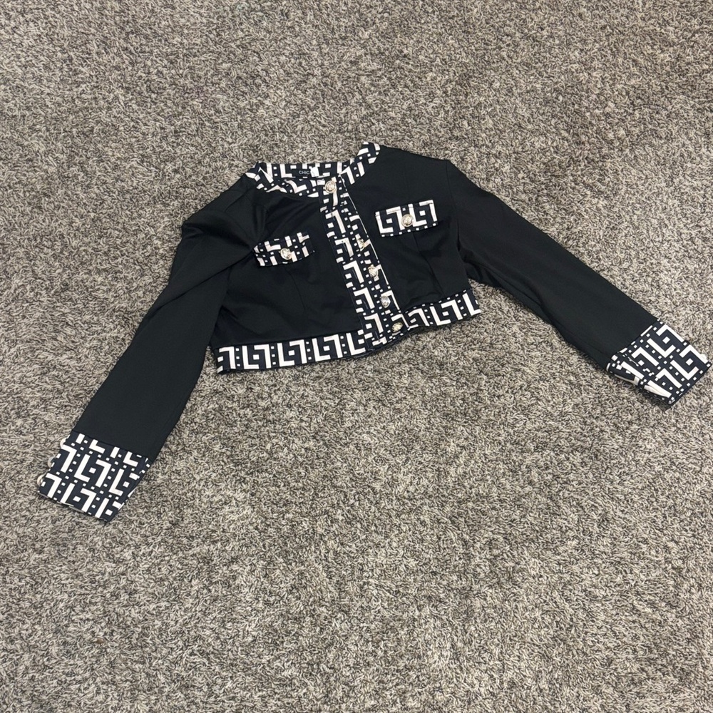 Chic Black Jacket with White Patterned Accents